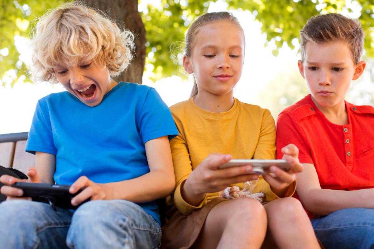 Kids Using Mobile Phone