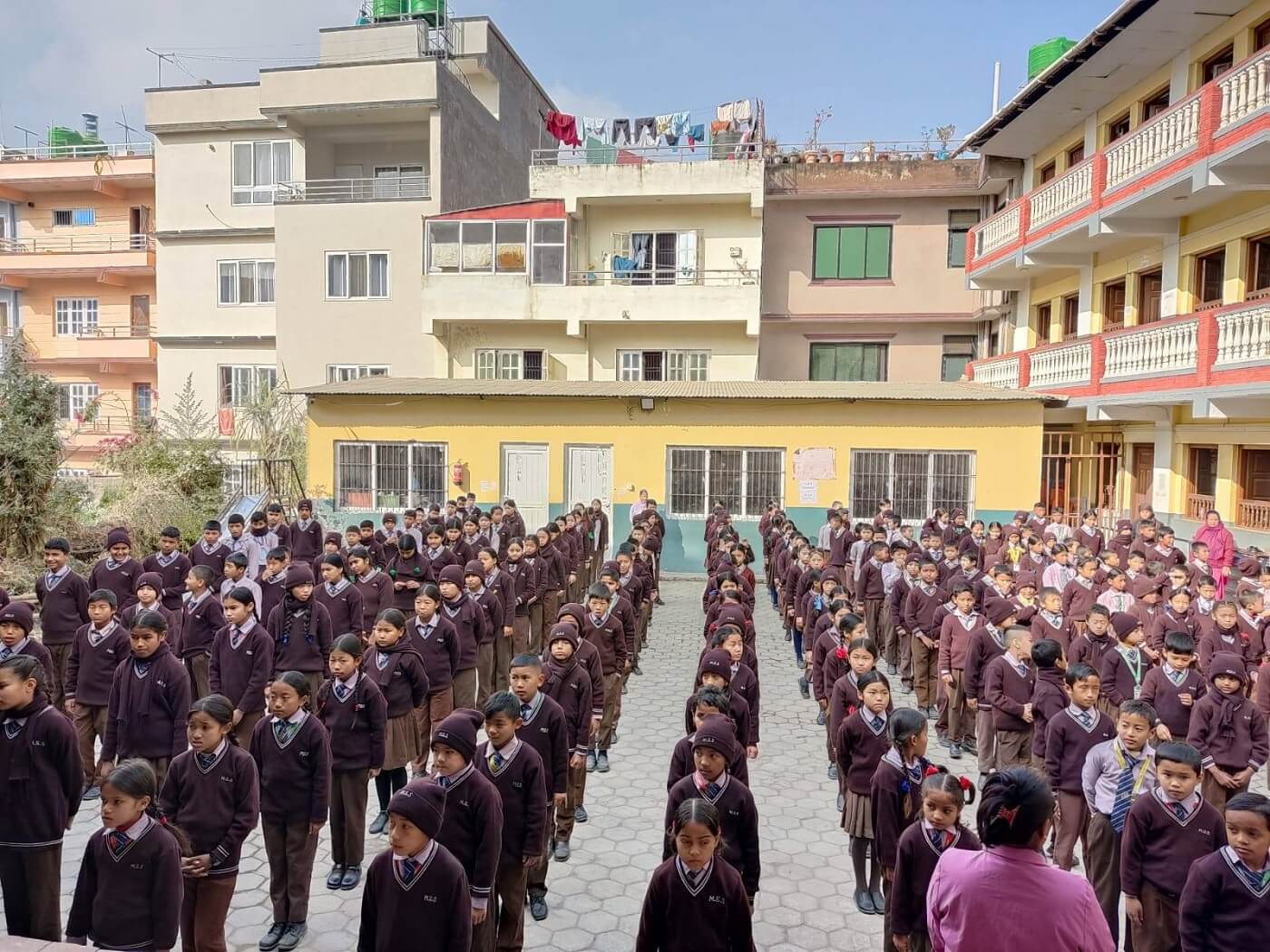 Manamaiju Secondary School Building and and Students 
